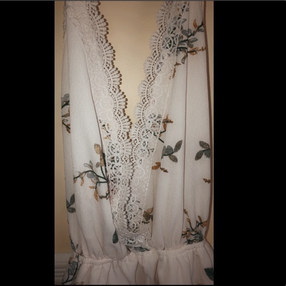 An open back romper/play suit - Picture 2 of 3